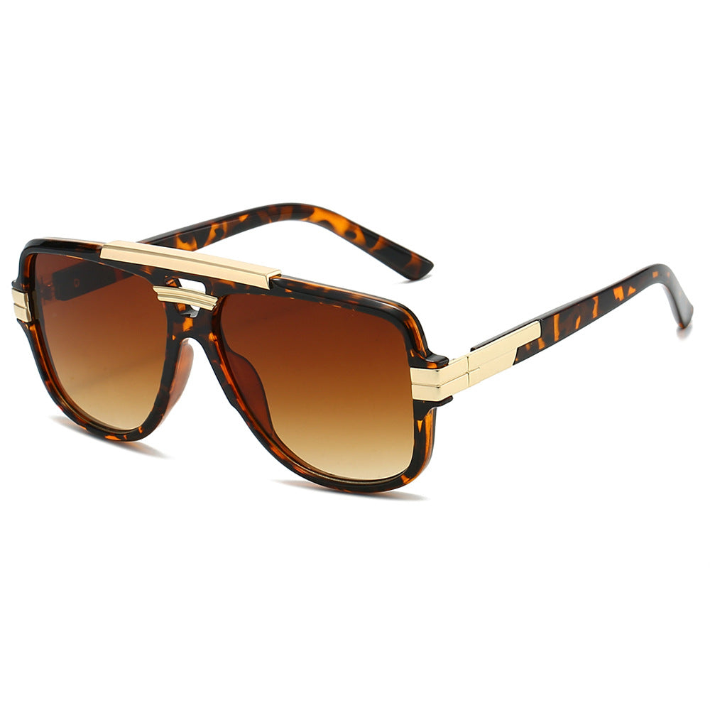 Tortoiseshell square retro sunglasses with gold brow bar and brown gradient lenses, product photo on a white background.