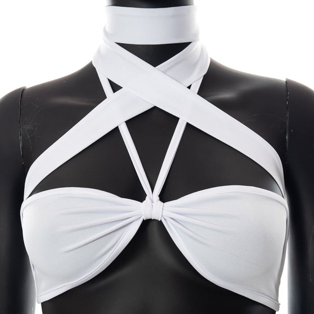Close-up front view of a black mannequin wearing the white halter crop top, highlighting the intricate crisscross strap design at the neck and chest, along with the gathered twist detail at the bust.