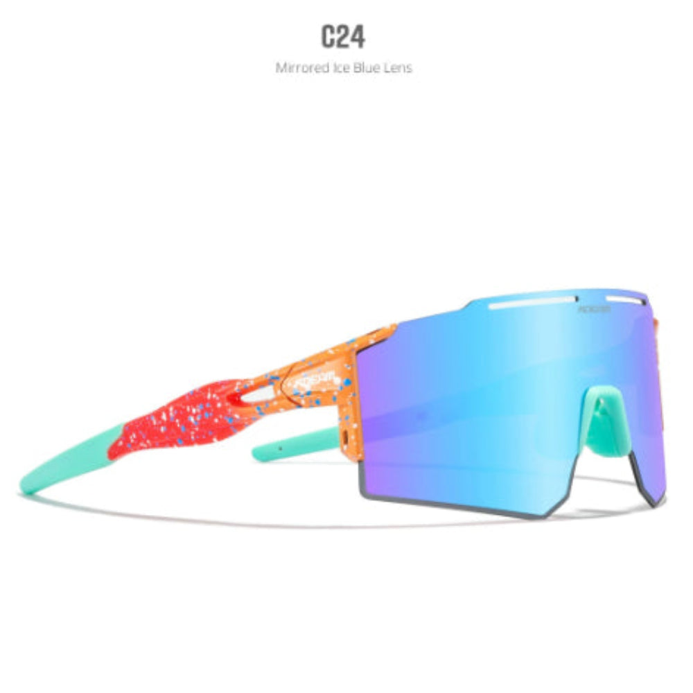 Oakley sunglasses featuring a vibrant red, orange, and turquoise frame with blue speckles, paired with a large iridescent blue-to-purple mirrored lens