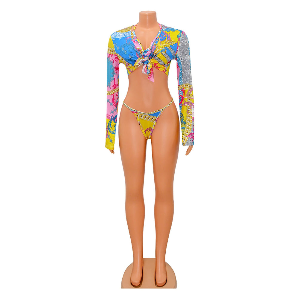 Colorful swimsuit on a mannequin against a white background