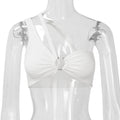 White ribbed bralette with front ruched gathering, silver O-ring hardware, and adjustable crisscross back straps, displayed on a clear mannequin.