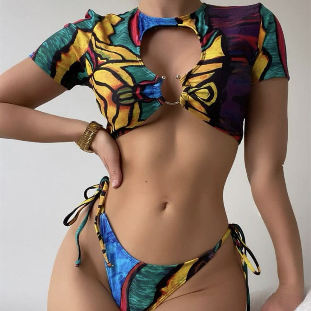 Colorful bikini with a patterned top on a plain background