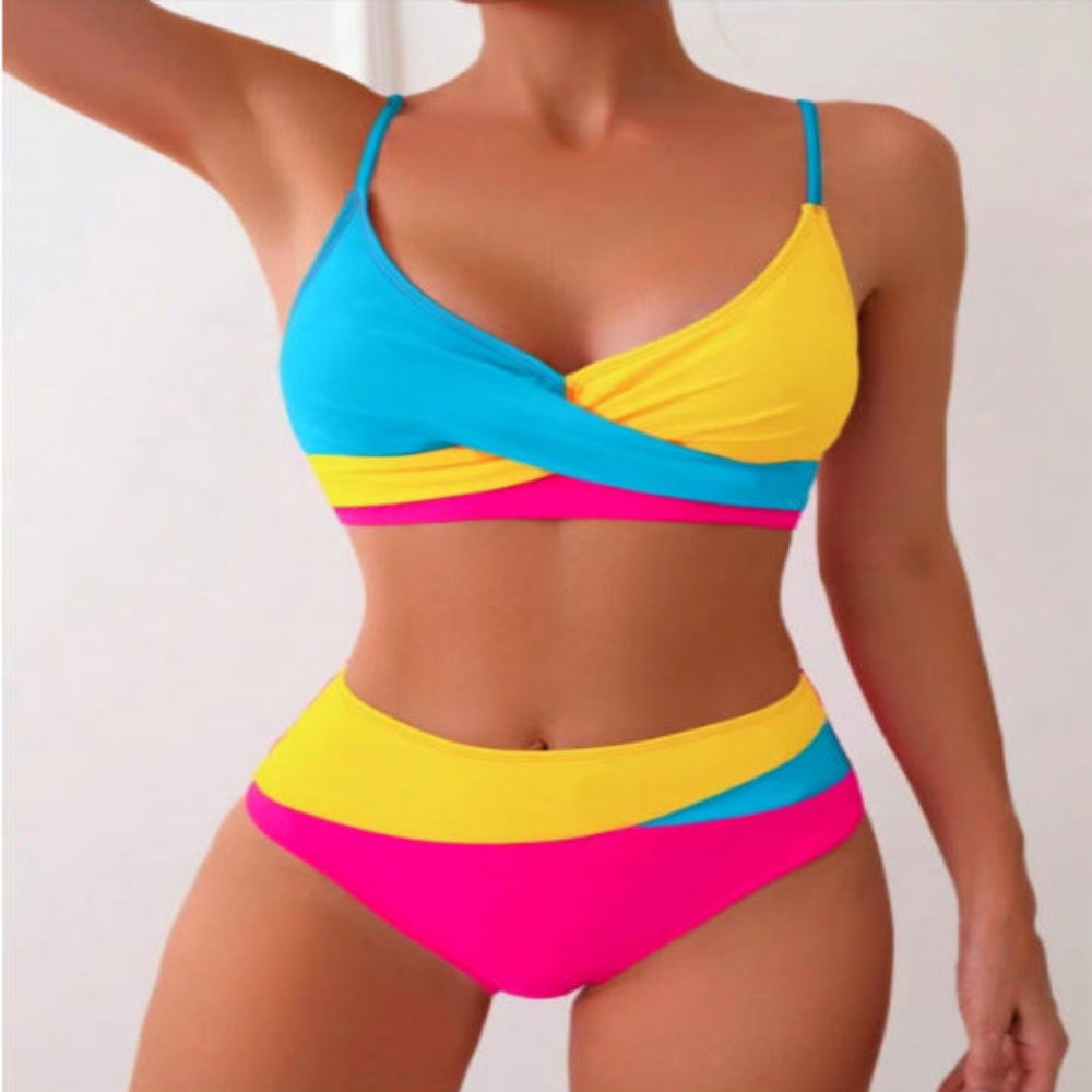 Colorful bikini set with blue, yellow, and pink straps on a white background