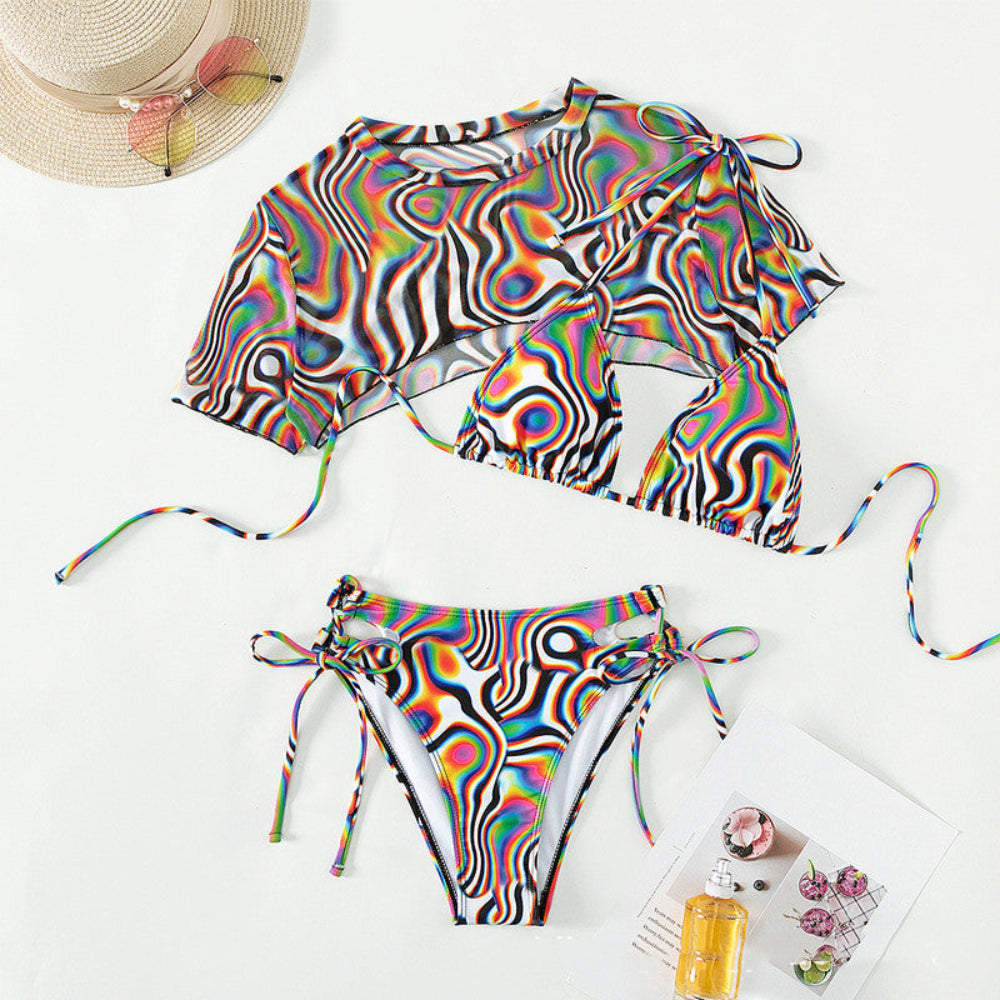 Colorful bikini set with a matching hat on a white background