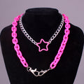 Pink star pendant chunky chain necklace – trendy pink and silver layered statement jewelry on mannequin.