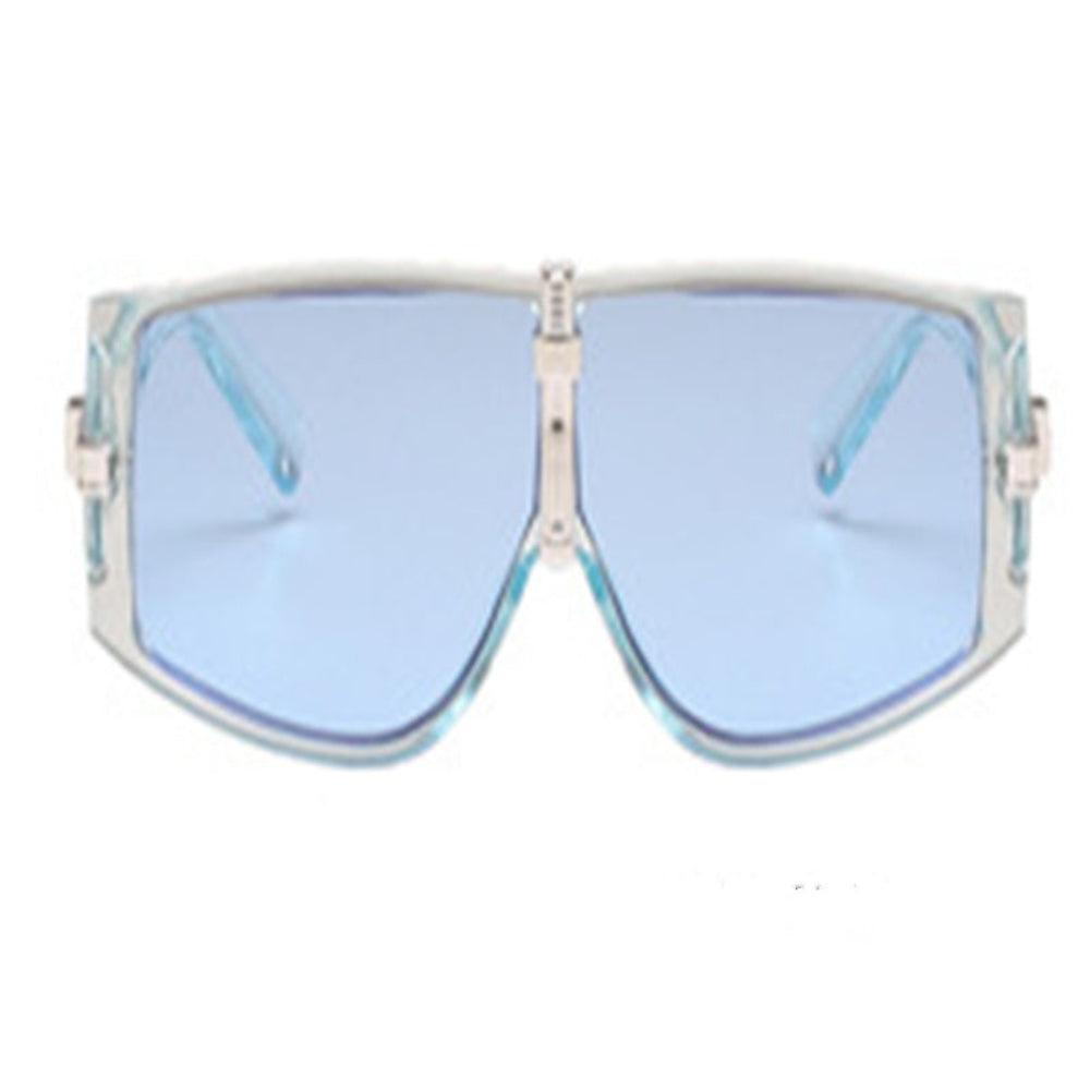 Futuristic translucent blue oversized rectangular shield sunglasses featuring a clear frame with light blue tint, silver metallic center bridge, and matching blue tinted lenses