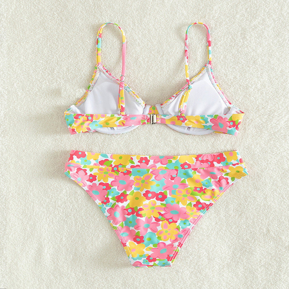 Colorful floral bikini set on a white background